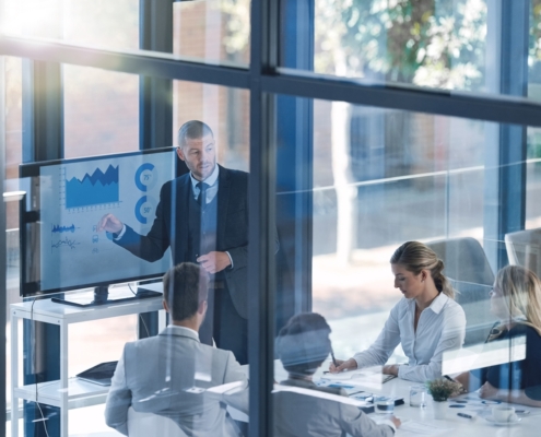 Fractional CFO advisor explaining what does a Fractional CFO do to a growing business owner in Guelph Ontario