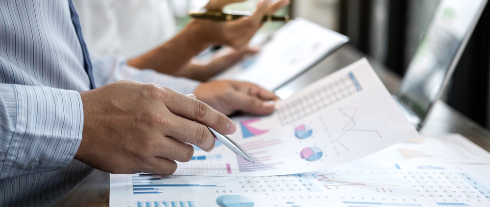Business owner learning how to read a business financial statement with a fractional CFO advisor in Guelph Ontario