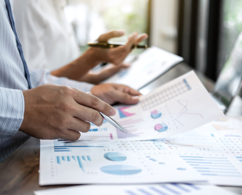 Business owner learning how to read a business financial statement with a fractional CFO advisor in Guelph Ontario